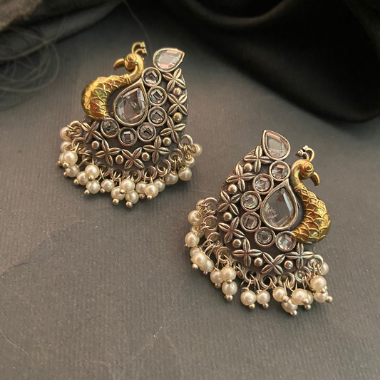 Pendientes de pavo real